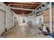 Unfinished basement with exposed ceiling, concrete floor, and white-painted walls ready for customization at 1848 Winthrop Se Dr, Atlanta, GA 30316