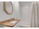 Cozy bathroom featuring a tub with white subway tile and a granite countertop vanity at 1848 Winthrop Se Dr, Atlanta, GA 30316
