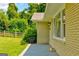 Exterior shot of a brick house with well-maintained landscaping and a side patio at 1848 Winthrop Se Dr, Atlanta, GA 30316