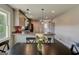 Charming kitchen with granite countertops, pendant lighting, stainless steel appliances, and a breakfast bar at 1848 Winthrop Se Dr, Atlanta, GA 30316