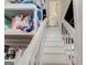 Basement stairway with storage shelves at 1848 Winthrop Se Dr, Atlanta, GA 30316