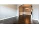 Formal dining area with hardwood floors, an archway, and a chandelier at 335 Autumn Bluff Dr, Lawrenceville, GA 30044