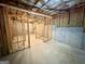 Unfinished basement shows exposed wood framing and concrete foundation at 237 Shockley Way, Dallas, GA 30157