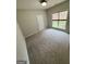 Bedroom features carpeted floors, a window for natural light and closet at 237 Shockley Way, Dallas, GA 30157