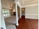 A spacious living room features hardwood and carpet floors and decorative pillars at 237 Shockley Way, Dallas, GA 30157