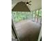 Spacious screened porch, ideal for enjoying serene outdoor views with its high ceilings and wooded scenery at 237 Shockley Way, Dallas, GA 30157