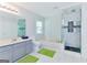 Bright bathroom featuring a shower and a soaking tub at 4180 Pineset Dr, Alpharetta, GA 30022