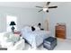 Bright main bedroom featuring a comfortable chair and vaulted ceiling at 4180 Pineset Dr, Alpharetta, GA 30022