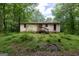 Exterior view of the home and surrounding property at 400 Mccart Rd, Mcdonough, GA 30252