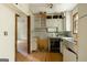 Bright kitchen featuring white cabinets and an open layout at 400 Mccart Rd, Mcdonough, GA 30252