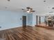 Spacious living room with an open layout, seamlessly connecting to the kitchen and dining areas at 424 Browning Field Way, Hampton, GA 30228