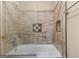 Bathroom showcasing a glass shower with tiled walls and a built in niche at 5833 Wembley Dr, Douglasville, GA 30135