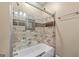 Contemporary bathroom featuring a tiled shower with a glass door, enhancing its modern aesthetic at 5833 Wembley Dr, Douglasville, GA 30135