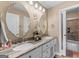 Bright bathroom features double vanity with granite countertops, and a walk in shower at 5833 Wembley Dr, Douglasville, GA 30135