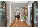 View of foyer and staircase features decorative trim and an open floor plan at 5833 Wembley Dr, Douglasville, GA 30135