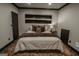 Cozy bedroom with warm lighting, decorative pillows, and unique wall decor at 6248 Sunshine Cove Ln, Buford, GA 30518