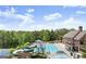 Enjoy the community pool with a waterslide, fountain, clubhouse, and tennis court in this beautiful neighborhood at 6248 Sunshine Cove Ln, Buford, GA 30518