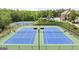 Tennis courts provide a recreational amenity, with well-maintained courts for sports enthusiasts at 6248 Sunshine Cove Ln, Buford, GA 30518