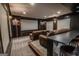 Basement theater room featuring leather reclining chairs at 6248 Sunshine Cove Ln, Buford, GA 30518