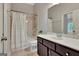 Bathroom featuring a shower and tub combination, stylish vanity, and neutral colors at 50 Star Spangled Ln, Peachtree City, GA 30269