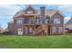 Large backyard with a wooden deck and plenty of green space at 266 Hanover Dr, Villa Rica, GA 30180
