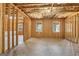 Unfinished basement with wood frame and windows providing natural light at 266 Hanover Dr, Villa Rica, GA 30180