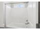 Bathroom with shower/tub and large window for natural lighting at 266 Hanover Dr, Villa Rica, GA 30180
