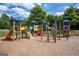 Community playground with slides, climbing structures, and various play stations at 266 Hanover Dr, Villa Rica, GA 30180
