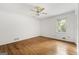 Bedroom featuring hardwood floors, a ceiling fan and a window at 955 Landmark Dr, Sandy Springs, GA 30342