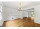 Charming dining room featuring hardwood floors and a chandelier at 955 Landmark Dr, Sandy Springs, GA 30342