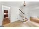 Foyer with staircase and hardwood floors at 955 Landmark Dr, Sandy Springs, GA 30342