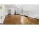 Bright living room featuring a fireplace, hardwood floors, and access to a closet for ample storage at 955 Landmark Dr, Sandy Springs, GA 30342