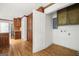 Spacious pantry featuring custom cabinets with plenty of storage space and hardwood floors at 955 Landmark Dr, Sandy Springs, GA 30342
