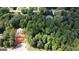 Aerial view of wooded homesite near existing neighborhood at 3019 Beverly Ct, Mcdonough, GA 30252