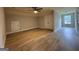 Bedroom features a ceiling fan and laminate flooring at 3019 Beverly Ct, Mcdonough, GA 30252