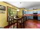 Bright dining area with large windows and seating for six, perfect for Gathering meals at 103 Everhill, Peachtree City, GA 30269