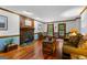 Cozy living room featuring hardwood floors, fireplace, and natural light at 103 Everhill, Peachtree City, GA 30269