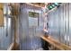 The shower boasts practical design with shower fixtures, a frosted window and a built-in bench at 103 Everhill, Peachtree City, GA 30269