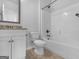 Clean bathroom with granite vanity and shower tub combination at 149 Elkins Blvd, Locust Grove, GA 30248