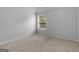 Cozy bedroom with a neutral color palette and a window at 149 Elkins Blvd, Locust Grove, GA 30248