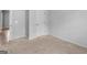 The bedroom provides neutral carpet, blank walls, a closet, and plenty of natural light at 149 Elkins Blvd, Locust Grove, GA 30248