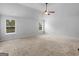 Spacious bedroom with natural light and ceiling fan at 149 Elkins Blvd, Locust Grove, GA 30248