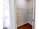 Walk-in closet equipped with white wire shelving for ample storage space at 3511 Brockenhurst Dr, Buford, GA 30519