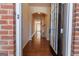Inviting entryway with gleaming hardwood floors and arched doorway at 3511 Brockenhurst Dr, Buford, GA 30519