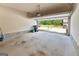 Two car garage featuring an open garage door and concrete flooring at 3511 Brockenhurst Dr, Buford, GA 30519