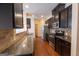 Well-equipped kitchen boasts stainless steel appliances and elegant granite countertops at 3511 Brockenhurst Dr, Buford, GA 30519