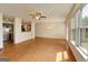 Open-concept living area with hardwood floors and natural light at 3511 Brockenhurst Dr, Buford, GA 30519