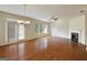 Spacious living room with hardwood floors, fireplace, and natural light at 3511 Brockenhurst Dr, Buford, GA 30519