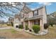 This two-story brick home has a two-car garage, landscaped yard and inviting covered front porch at 3225 Alhambra Cir, Hampton, GA 30228