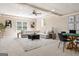 Large basement featuring a sectional sofa and a game table, perfect for entertainment at 450 Riverwalk, Mcdonough, GA 30252